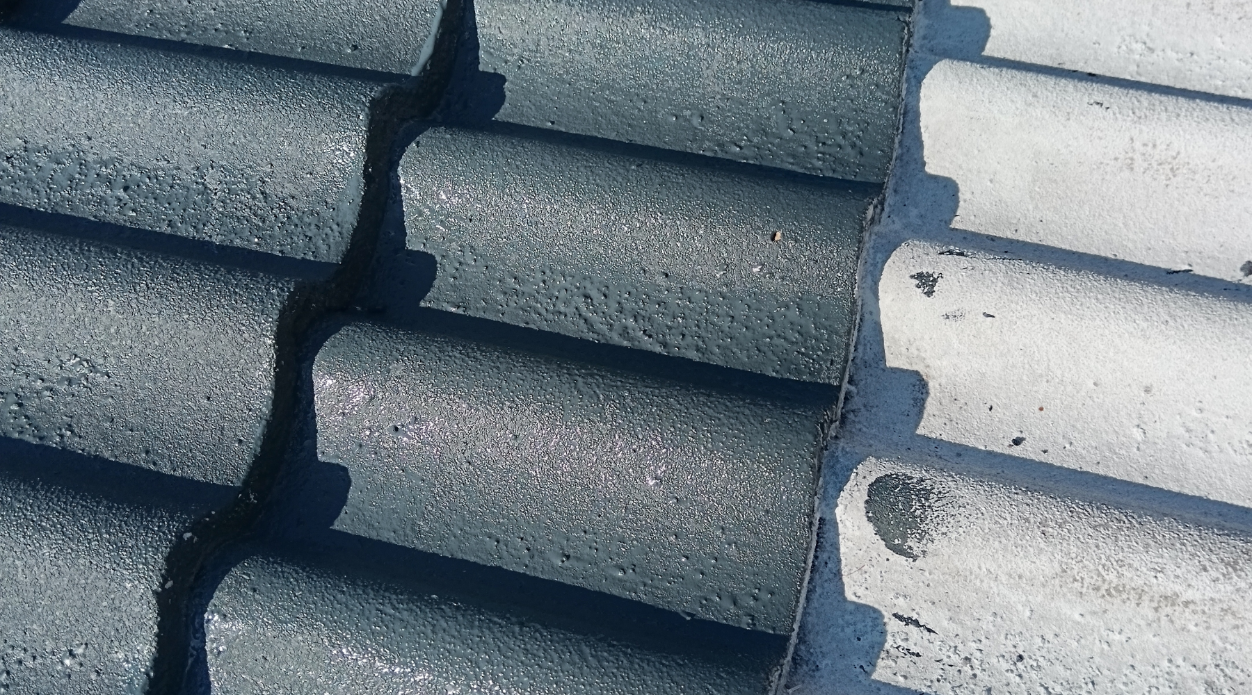 Professional roof spray painting and restoration in Pietermaritzburg by Midlands Exterior Cleaning.